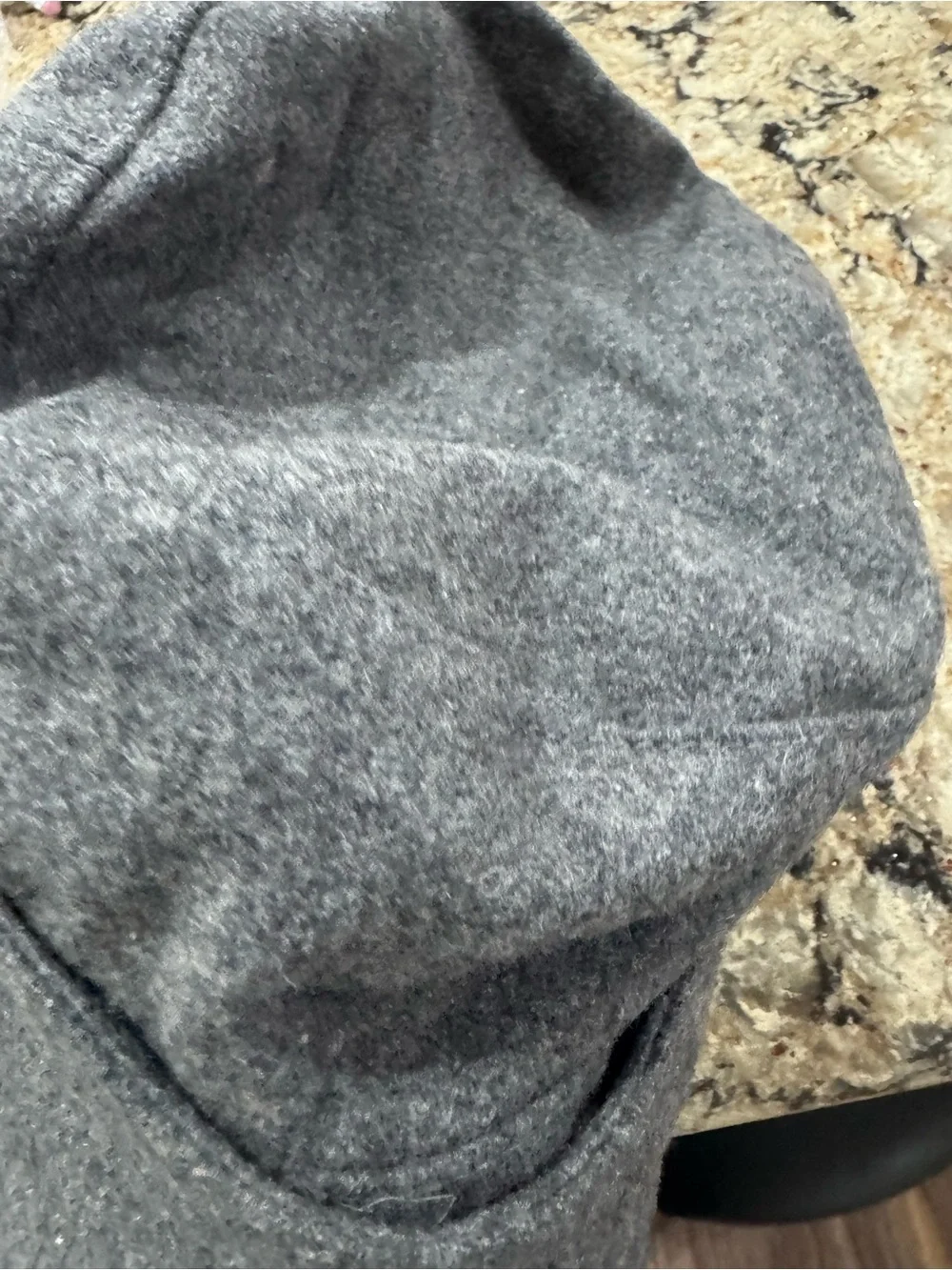 Gray newsboy cap features a felted wool blend material (CL-3)